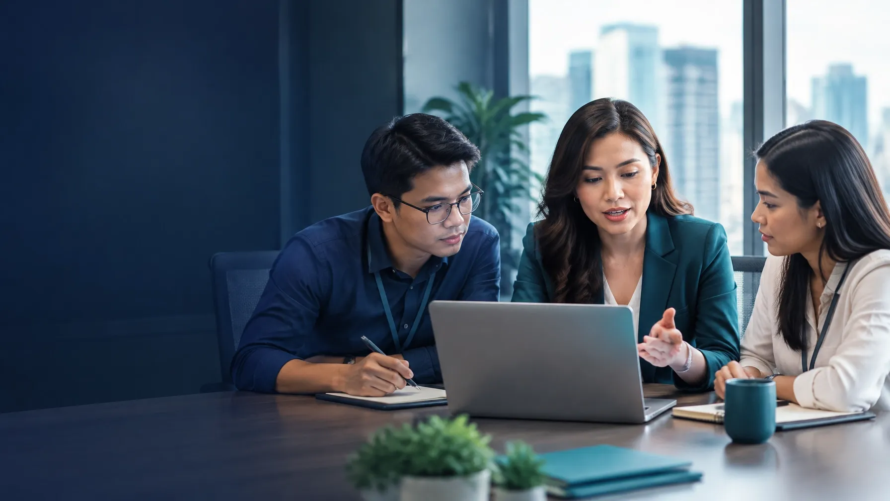 Colleagues discussing business plans together in a modern workplace